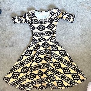 LulaRoe size xxs, cream and black colored.